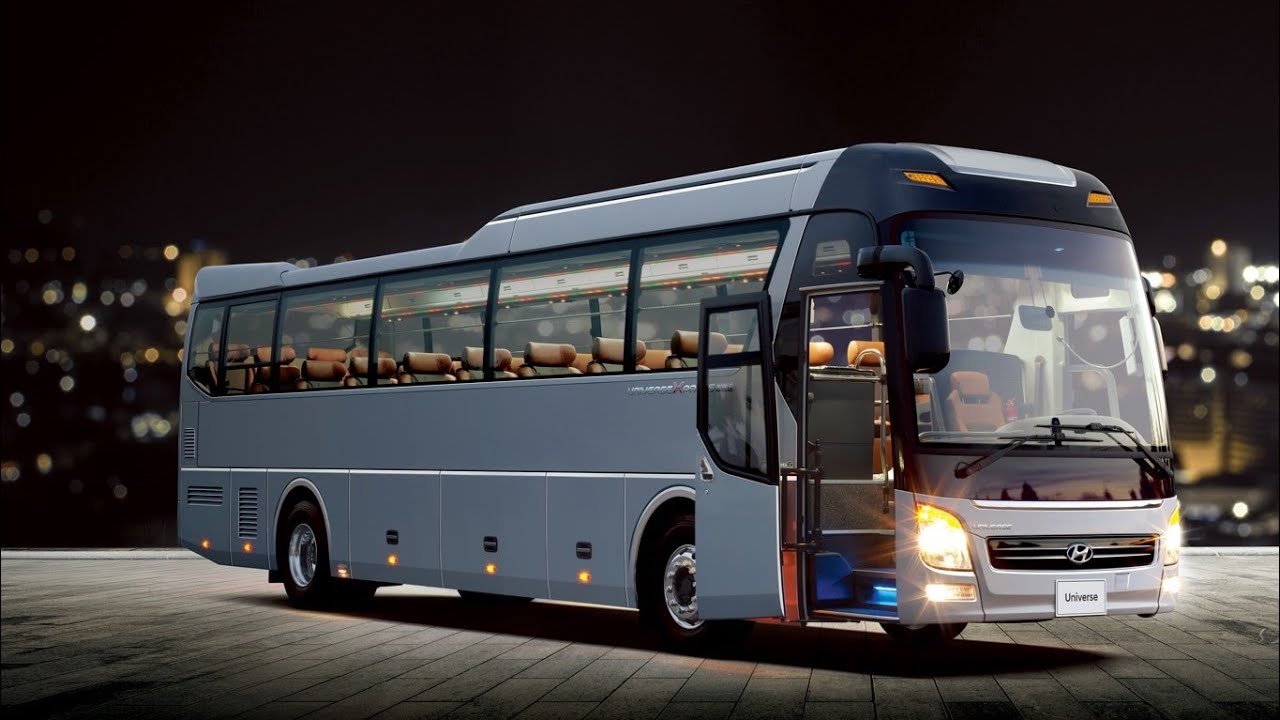 GCT shuttle bus with its door open at night